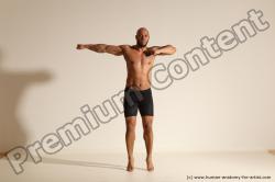 Underwear Gymnastic poses Man Black Muscular Bald Dancing Dynamic poses Academic